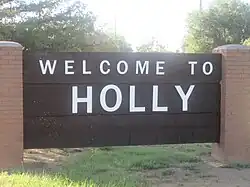 Holly welcome sign.
