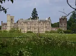 The rear frontage of the house - the central block is by Barry, the towers Lovelace's additions