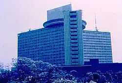 Tall modernist hotel tower with regular window grid pattern