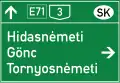 Tabular road sign on major road (two directions)