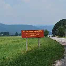Thumbnail image of Huttonsville State Farm WMA entrance sign