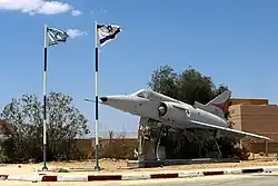 An IAI Kfir C.1 jet from the 1970/80s at the main gate of the airbase