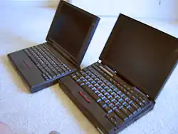 An IBM ThinkPad 310ED and a 760ED, both from the 1996–97 era. The 760ED boasts the unique flip-up keyboard that was standard on all 760 ThinkPads.