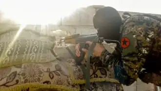 An IRPGF fighter during the Battle of Raqqa in 2017