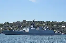 Grey ship, decorated with many pennants