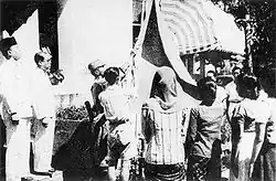 Image 112Indonesian flag raising shortly after the declaration of independence (from History of Indonesia)