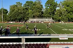 A game of ultimate played on a field
