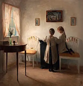 Interior with two girls (c. 1900)