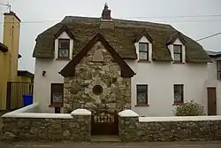 Thatched roof house in Kilmore Quay, Ireland