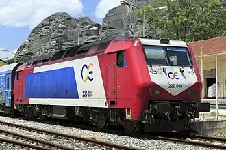 An Express train (Athens–Kalambáka) at Kalambaka station with OSE logo, May 2016