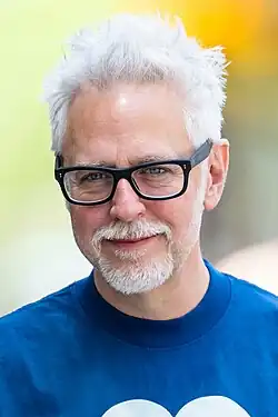 James Gunn smiling on the set of the 2025 film Superman in 2024