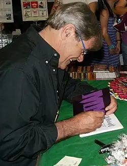 Lee at a book signing in 2012