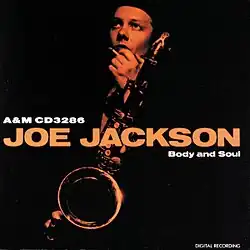 An orange-tinted photograph of Jackson holding a saxophone against a black background. The album title and artist's name are displayed in bold orange text on the right side, with the catalog number (AMLX 65000) positioned above the title.