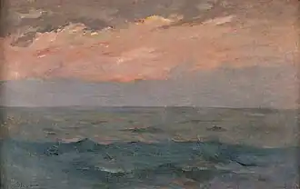 Rough seas under glowing skies