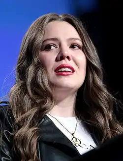 Headshot of Joy Huerta facing left