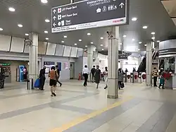 Unpaid area of the concourse level of the LRT station where the ticket vending machines are located, after refurbishment in 2018.