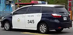 Pre-facelift Toyota Wish 2.0E as a police car