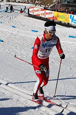 Masaaki Kozu competing in a cross-country skiing event.