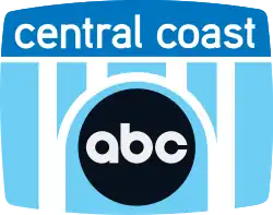 Inside a television screen shape, a stylized bridge in white. The part above the bridge is royal blue and contains the words "central coast" in white in a sans serif. The part beneath the bridge is sky blue in color. The middle arch of the bridge is semicircular, and nestled under it is the ABC network logo, a black disk with the letters a b c in round-bodied lowercase.