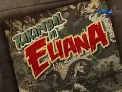 An image of a book, over a wood background. The series title is displayed on the center of the image. The logo of GMA Network is displayed on the upper right side of the image.