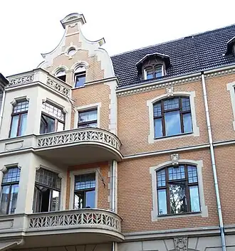 Detail of the balcnies, terraces and left gable