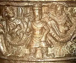 Detail of Kanishka, surrounded by the Sun-God and the Moon-God.