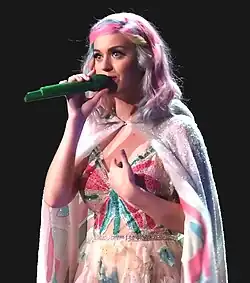 A woman holding a microphone