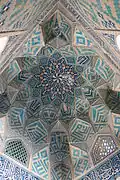 Mosque cupola, with Quranic inscriptions and Kufic representations of Allah's and Muhammad's names worked into the tiling