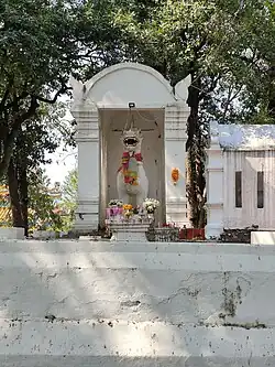 Lion statue facing east