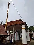 Kidangoor Subramanya Temple front side flag post