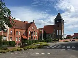 Primary school and Saint James church in Ostrowite
