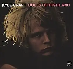 A close-up photo of Kyle Craft. Both the artist's name and album title appear above him, colored in white and pink respectively.