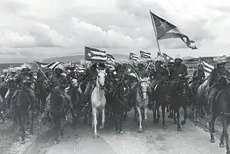 Staged photo of rebel cavalry. January 1959.