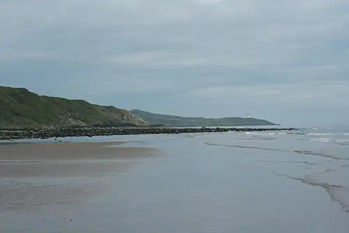 Larbrax beach, Broadsea Bay, with view of Killantringan Lighthouse