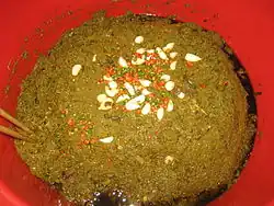 Lahpet dressed with garlic and chilli
