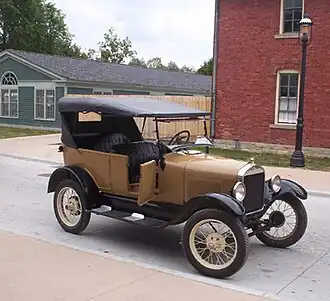 A Model T parked in a parking lot