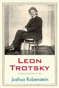 Book cover of Leon Trotsky: A Revolutionary's Life by Joshua Rubenstein, showing a portrait of Leon Trotsky sitting on a stool.