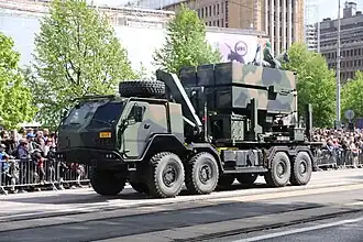 NASAMS (ITO 12) surface-to-air missile launcher carried on Sisu E13TP all-terrain 8×8 truck