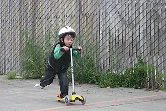 A Mini Micro scooter with three wheels