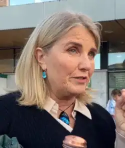 Photograph of Liz Gunn speaking to media.