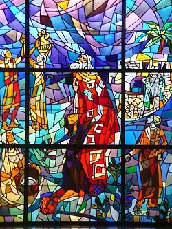 Stained glass depicting the parable of the prodigal son (side nave)