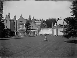 a large stone building set in a park