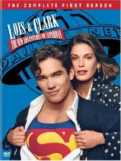 Lois Lane and Clark Kent, with Lois opening Clark's shirt to reveal his Superman logo