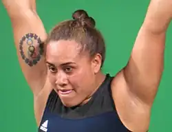 An Olympic tattoo on the upper arm of weightlifter Luisa Peters