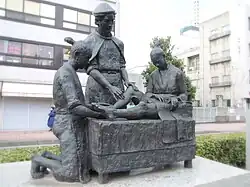 Bronze statue in front of the Almeida Memorial Hospital in Ōita