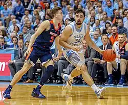 Kyle Guy defends Luke Maye