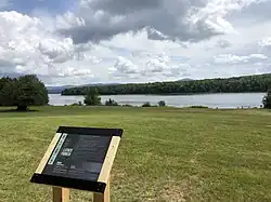 Marker, and view across a section of the lake