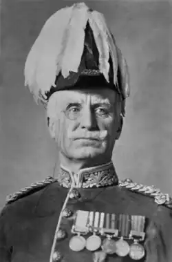 Man in British army General's uniform, moustached, looking authoritative