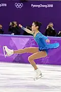 Flying sit spin (Satoko Miyahara)