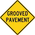 W8-15 Grooved pavement